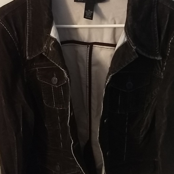 Black denim jacket with white running through it. - Picture 4 of 4